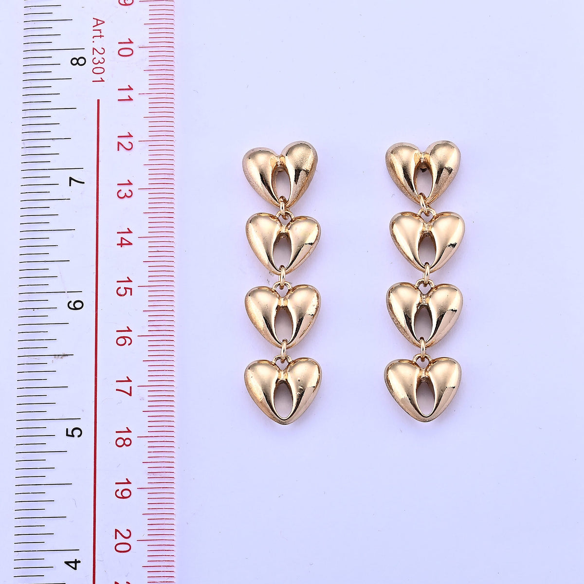 Dangling Heart Earrings in Goldtone