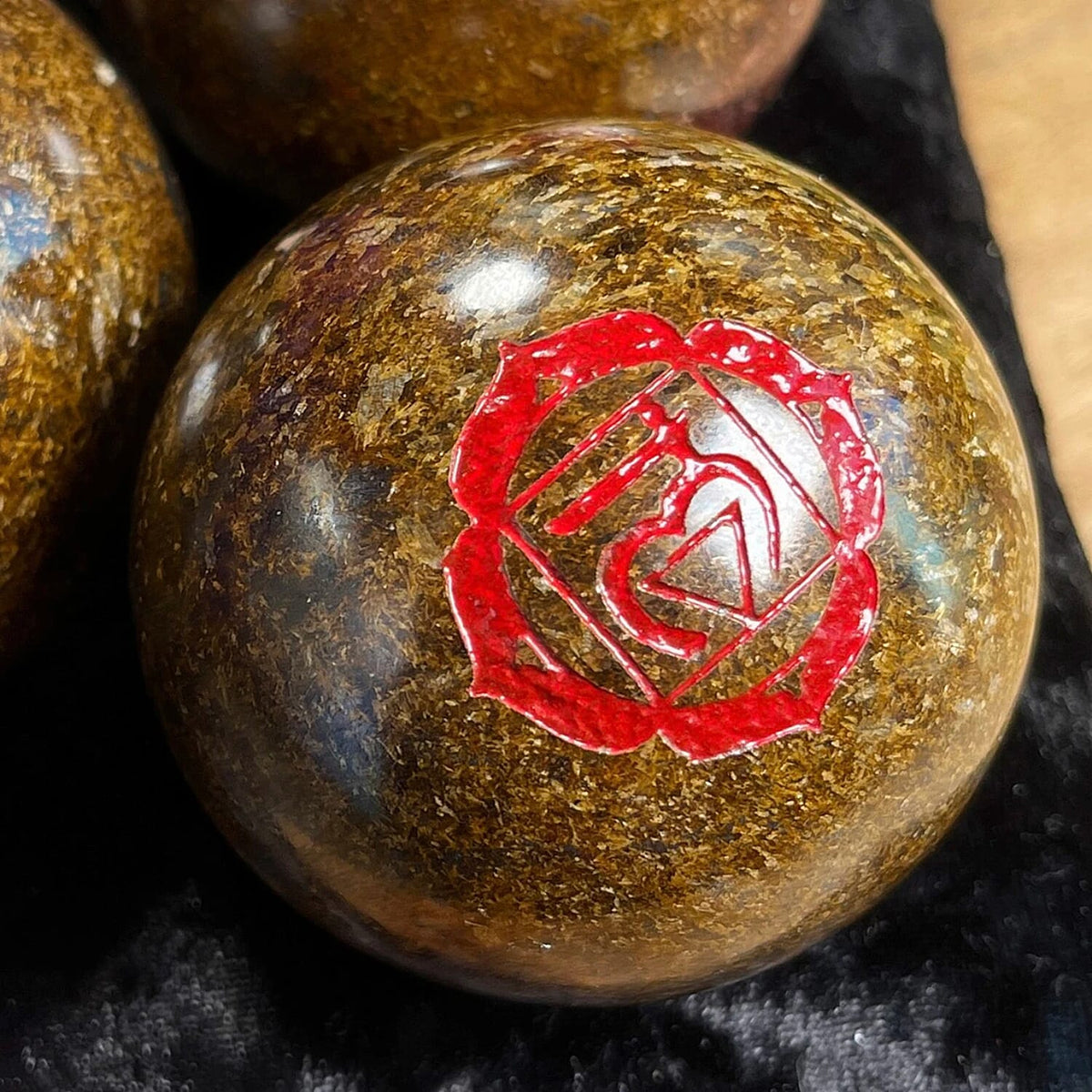 Root Chakra Symbol Engraved Bronzite Sphere 1400ctw (Ships in 8-10 Business Days)